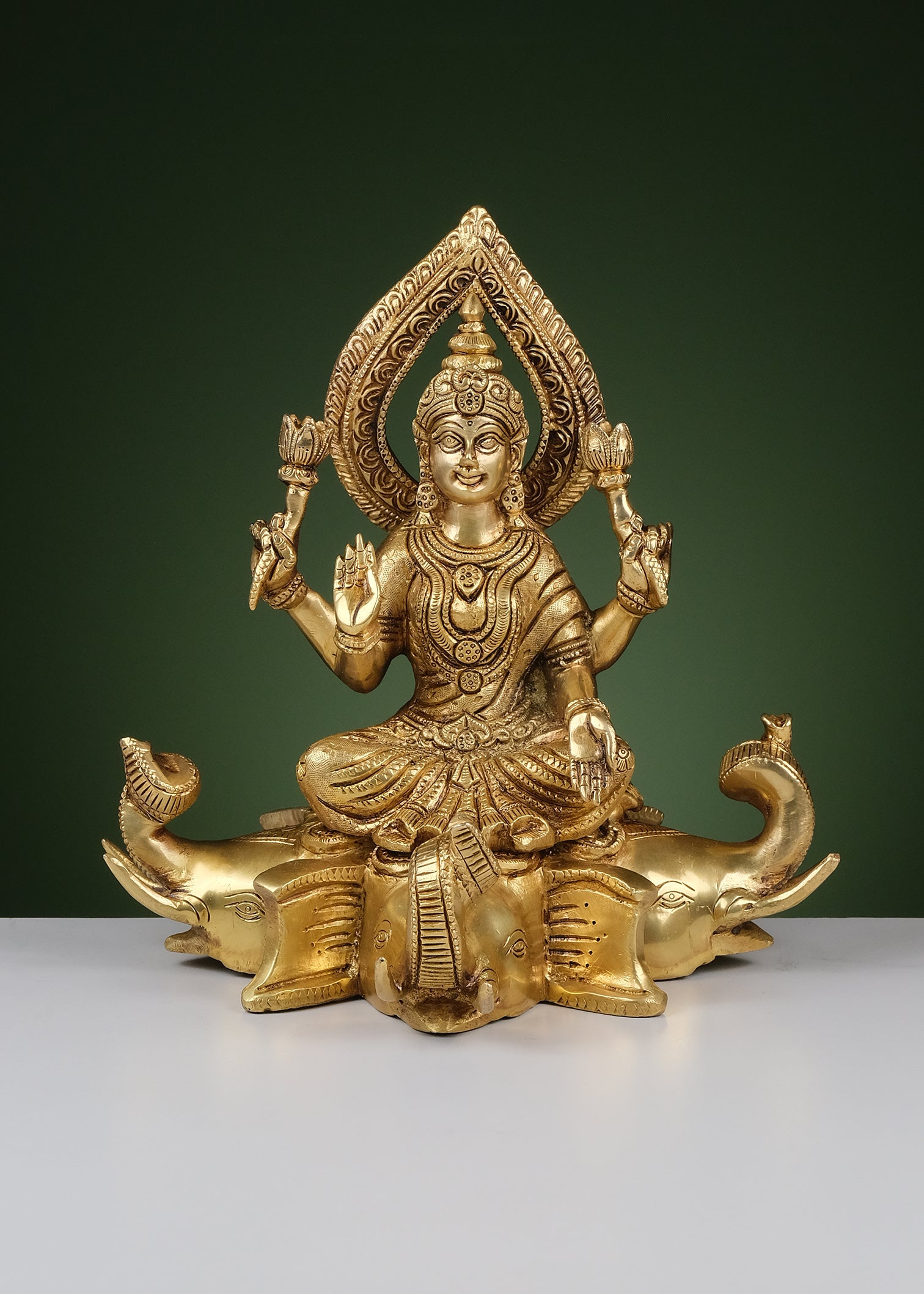 Brass Laxmi Sitting On Elephant Head