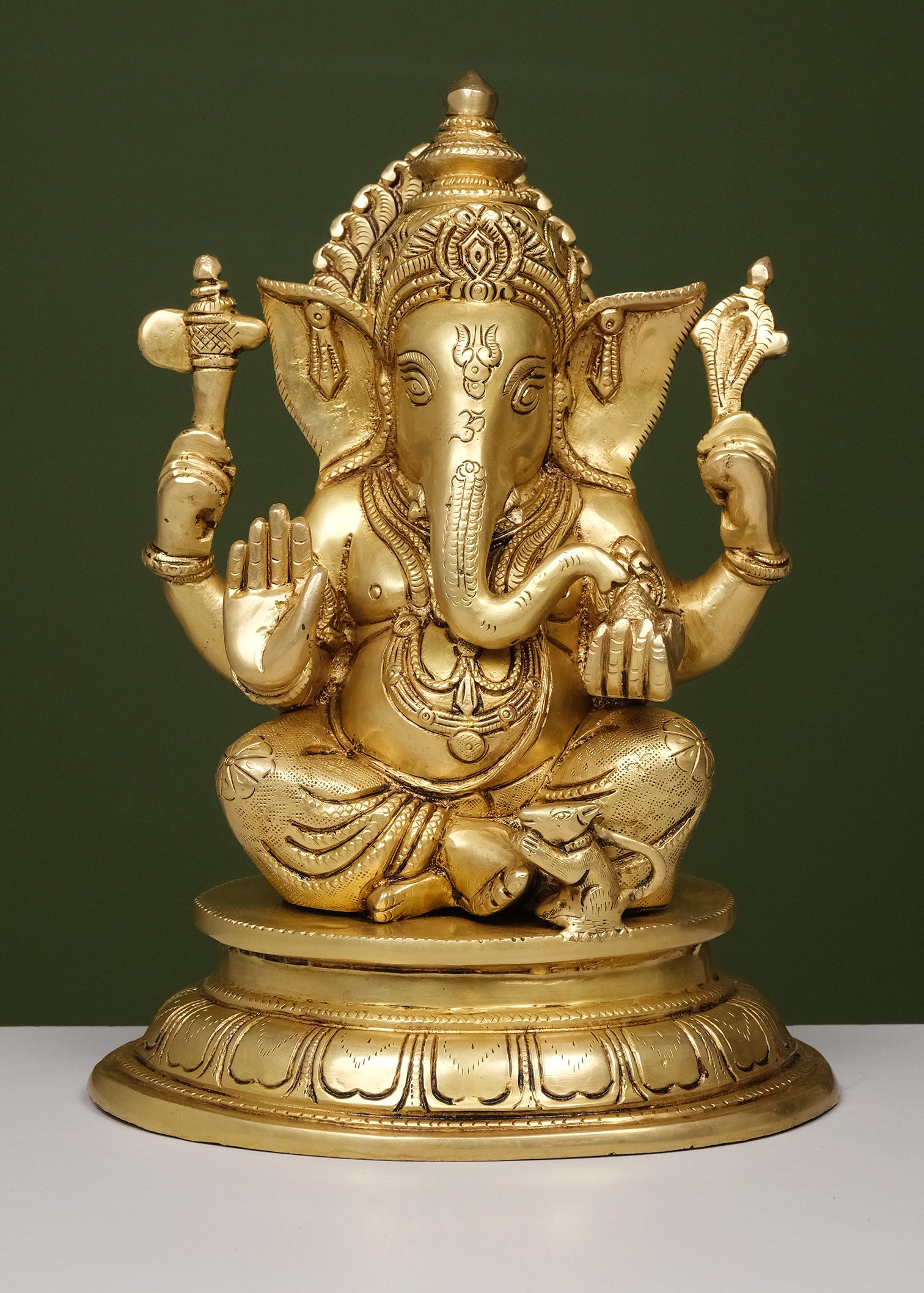 Brass Ganesha Sitting Round Base