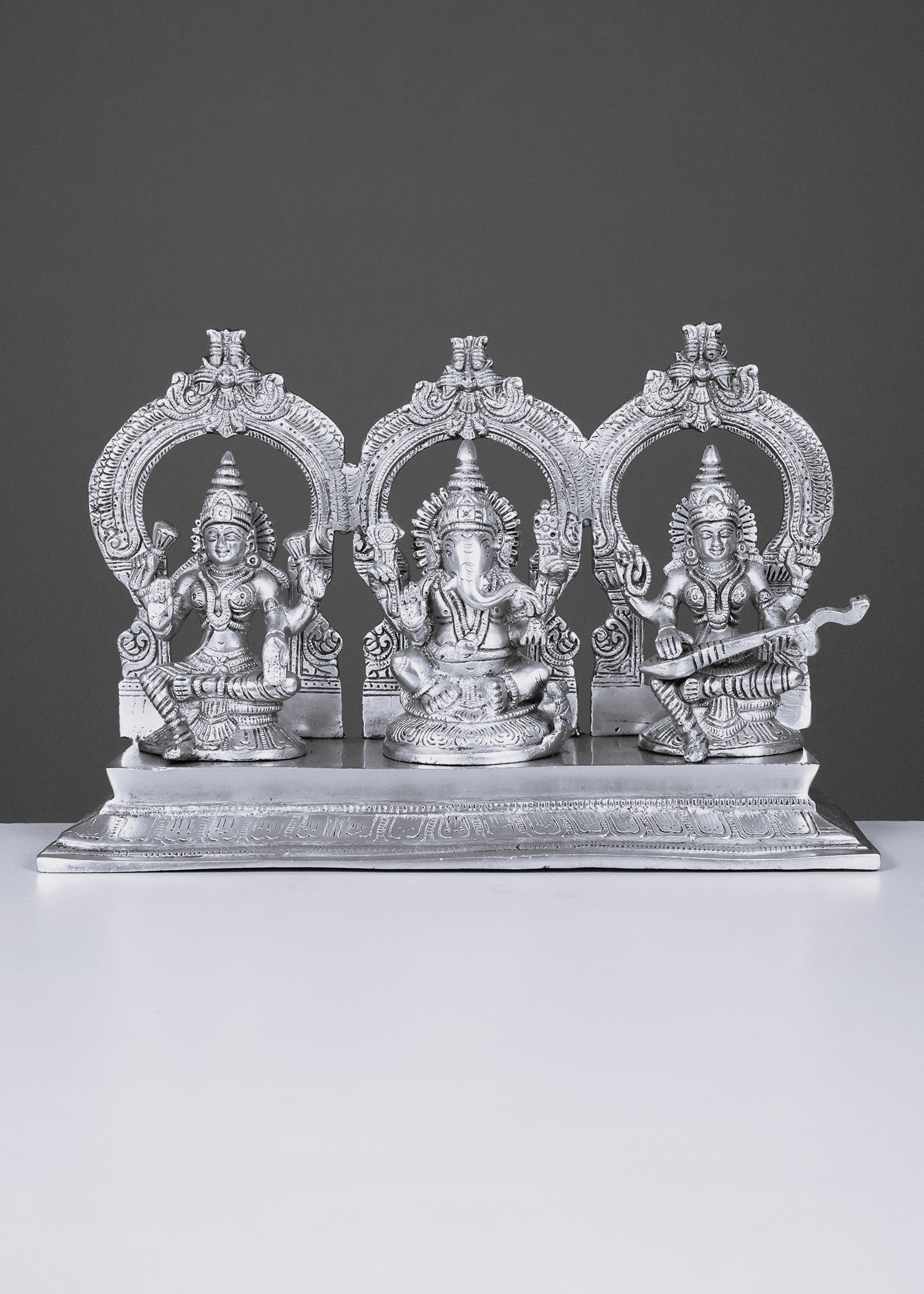 Brass  Golden Tone  Ganesh Laxmi
Saraswati on Base
with Ring