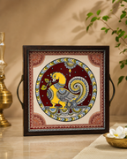 Kalamkari Decorative Tray featuring intricate traditional artwork with a vibrant yellow bird on a red background.