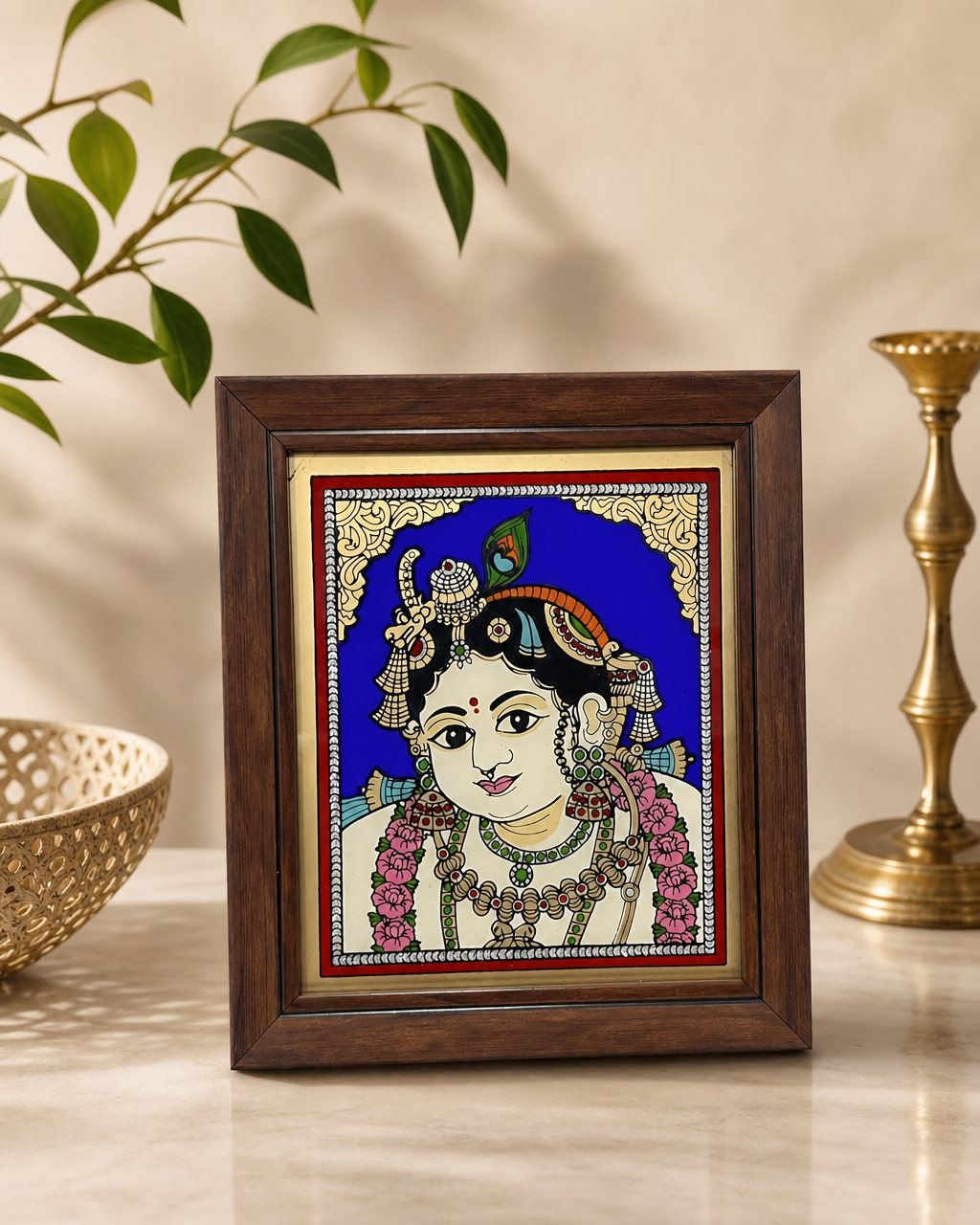 Tanjore reverse glass painting with an intricate depiction of Krishna in a wooden frame, showcasing vibrant colors and traditional design.
