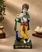 Murli Krishna statue with peacock, colorful traditional decor