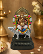 Detailed Alangara Vinayagar statue with colorful ornaments and decorative base.