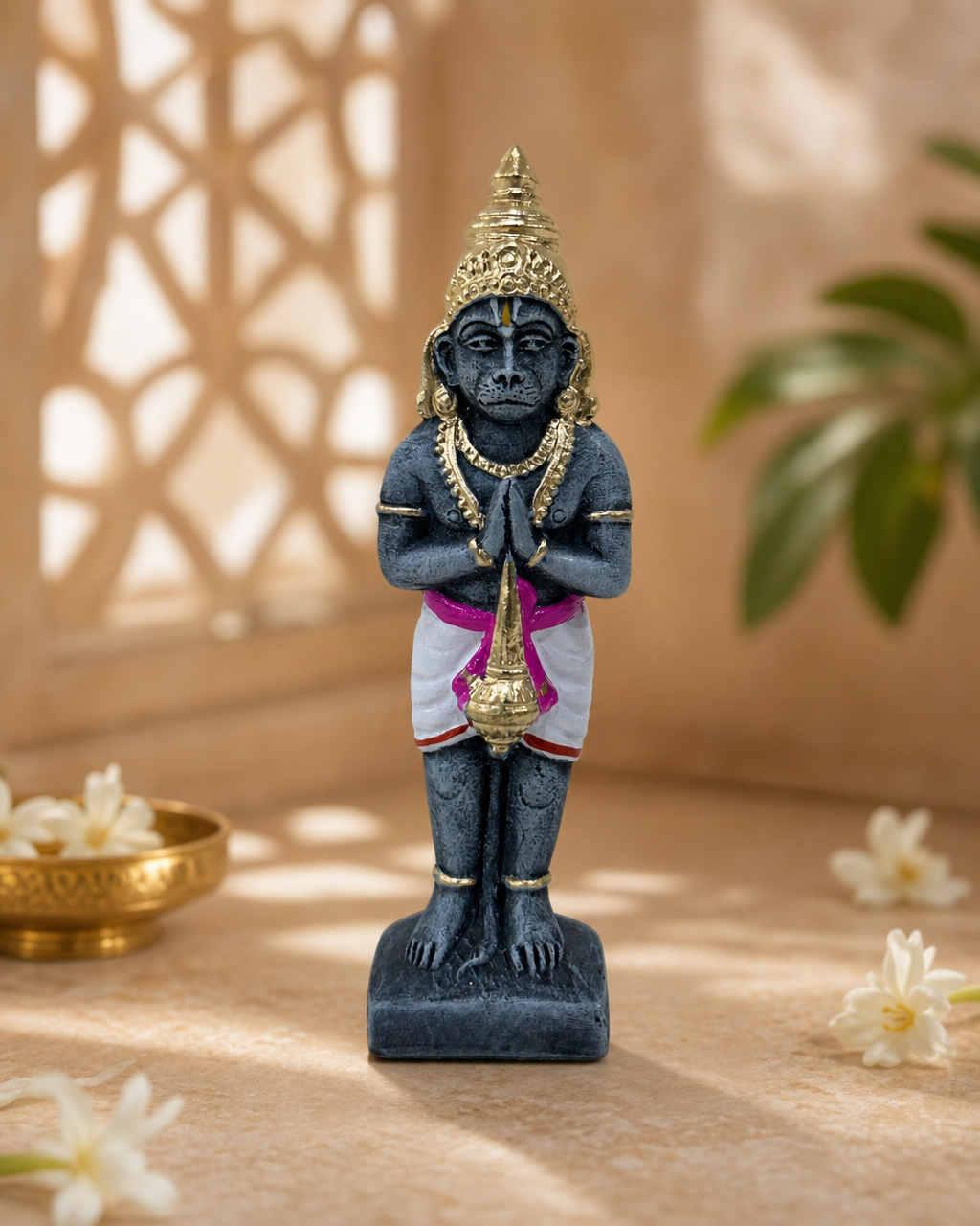 Exquisite statue of Hanuman with detailed features in a serene indoor setting.