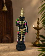 Small Meenakshi statue with intricate detailing, standing design with gold accents.