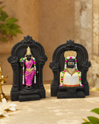 Exquisite Meenakshi Sokkanathar Jodi idol set on a beige surface with intricate designs and vibrant colors.