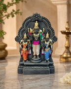 Decorative Murugan Valli Deivanai statue with intricate details on a marble surface.