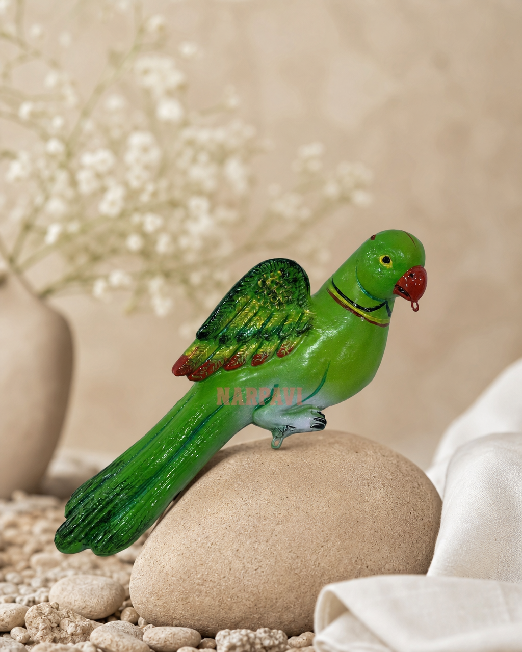 Green old model parrot figurine perched on a stone with a soft background