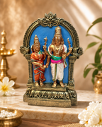 Intricate Thirumanachery Udvaganathar statue with vibrant colors and detailed craftsmanship displayed on a decorative surface.