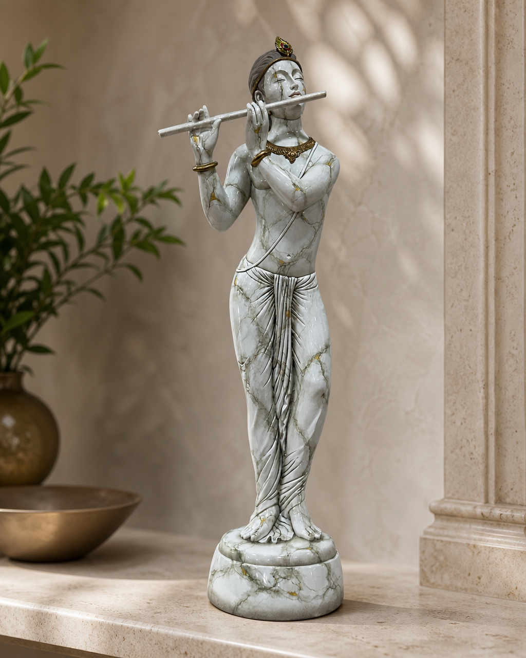 Elegant handcrafted statue of Lord Krishna playing the flute, detailed artistry.