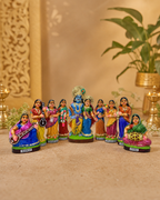 Colorful Krishna Ashtasakhi statues set with multiple figures.