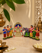 Colorful Manakula Vinayagar Set featuring a detailed deity with accompanying figures and traditional decor.
