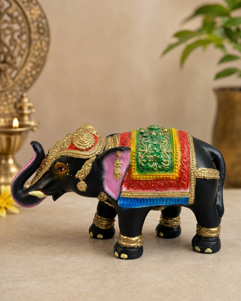 Colorful and intricately designed decorative elephant statue with ornate details