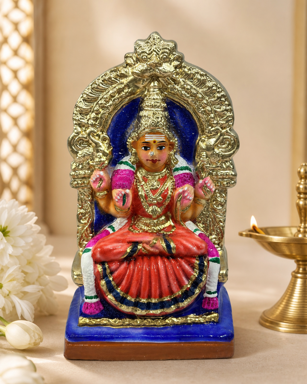 Beautiful Clay Kamakshi Idol with intricate details and vibrant colors, ideal for home decoration and spiritual spaces.