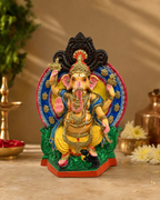 Colorful Darbar Vinayagar statue displayed with artistic decor elements.