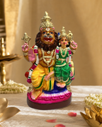 Colorful Lakshmi Narasimha statue with intricate details, ideal for spiritual decor and gifting.