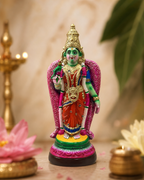 Intricately crafted Meenakshi statue with vibrant colors and details