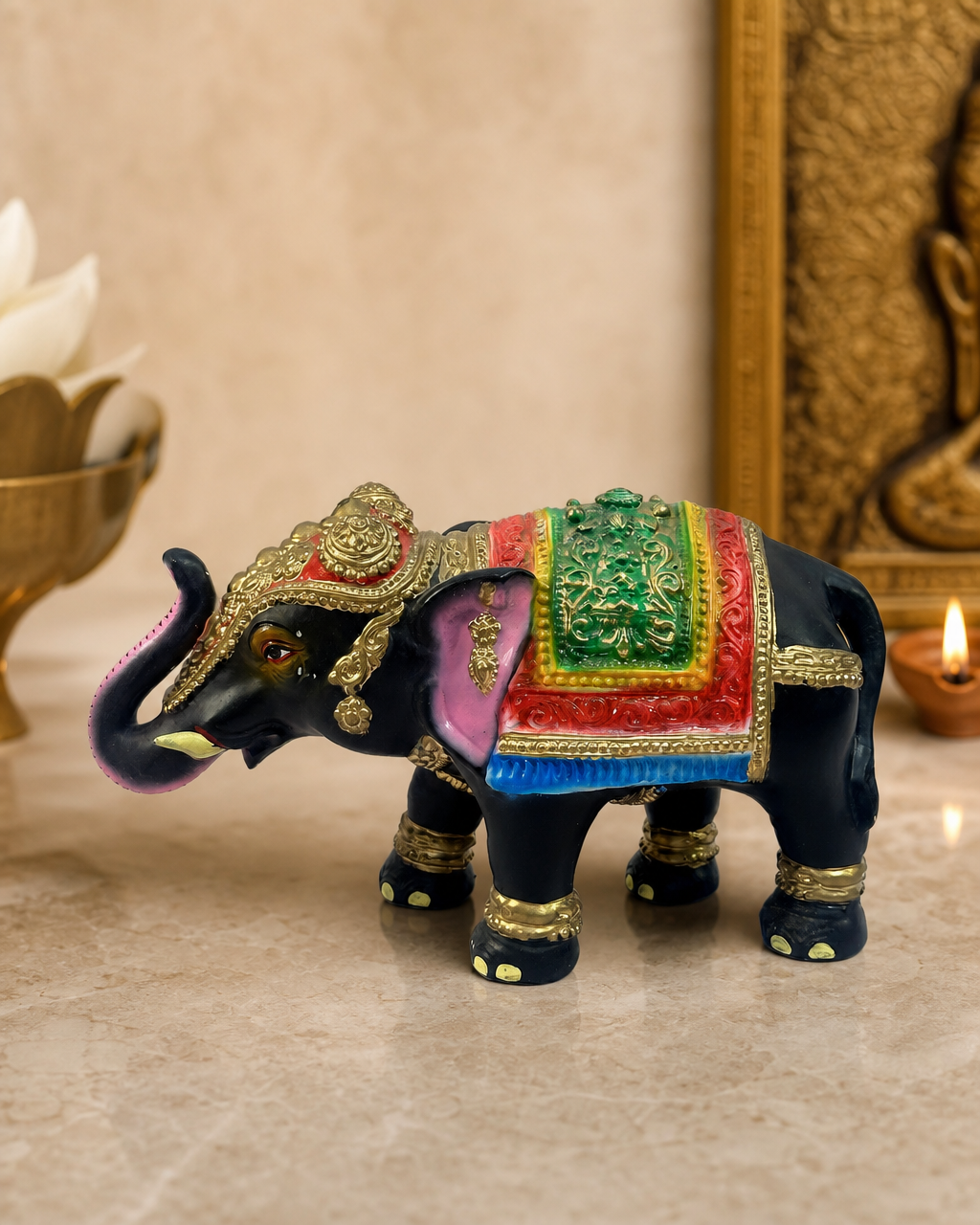 Colorful and ornate Nindra Brahma Saraswathi elephant figurine with gold detailing.