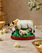 Elegant decorative figurine of a cow and calf, Pasu Kandru design