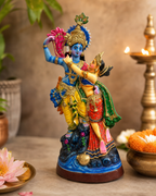 Colorful Radha Krishna statue with intricate details, ideal for home decor and spiritual ambience.